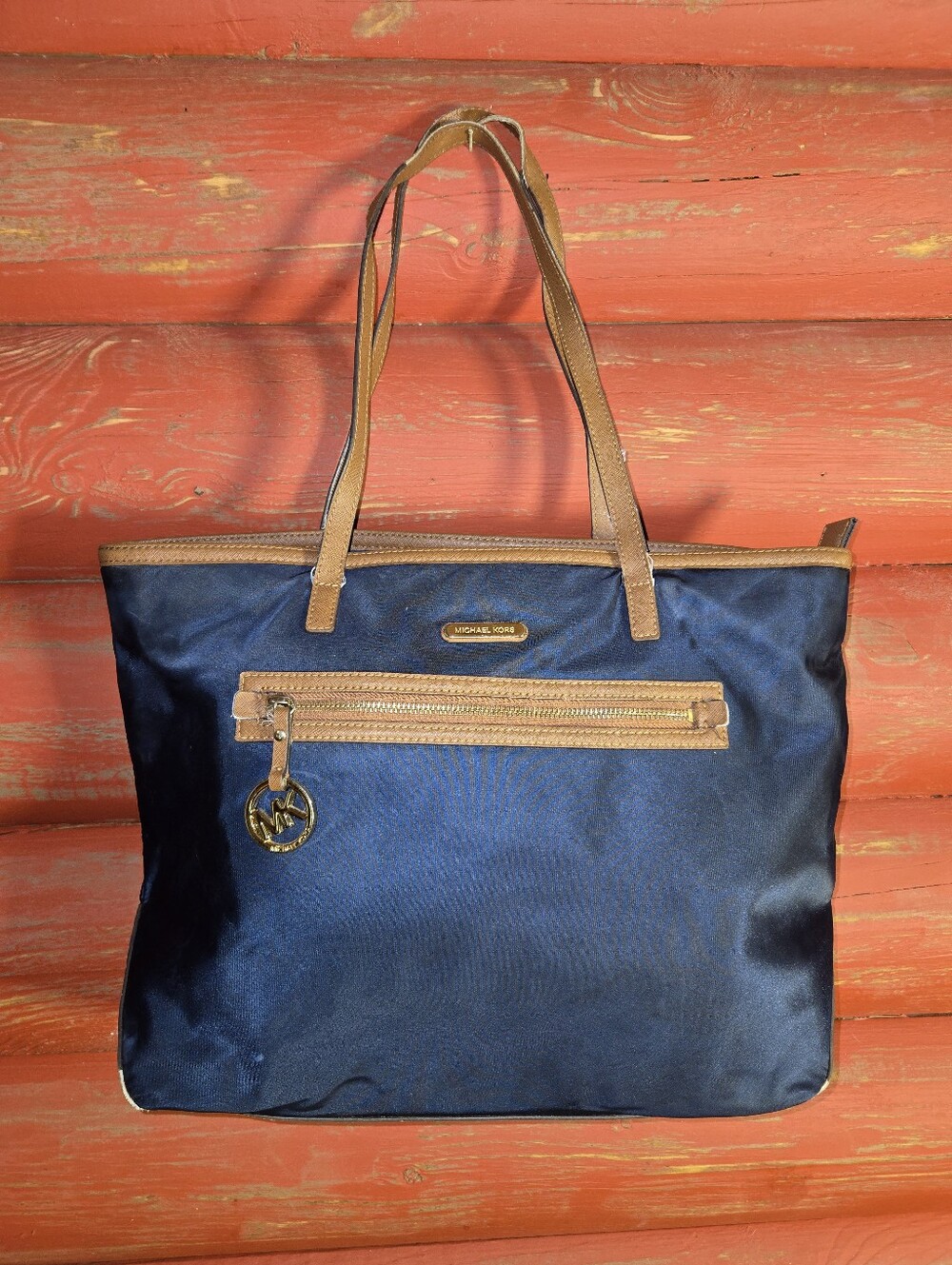 Damage On Handle & Bottom Michael Kors Navy Tote with Brown Trim and MK Charm